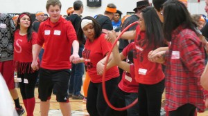 Sophomores race to win the hula hoop relay