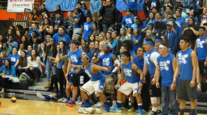 The Junior class waits in suspense for the referees to decide the winer of the Thrasketball game.