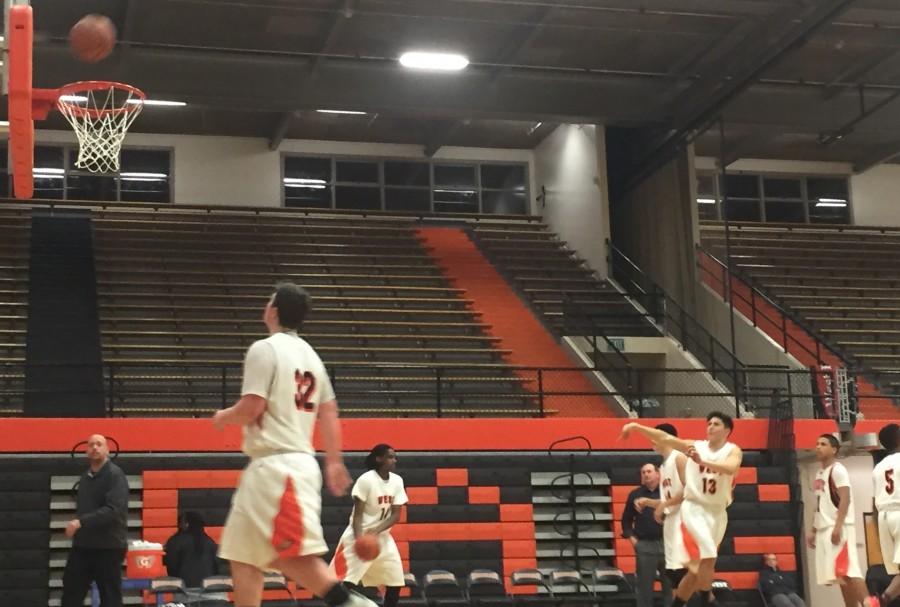Wests JV basketball team warming up during the half time against Eagle River at West High school January 13th, 2016.