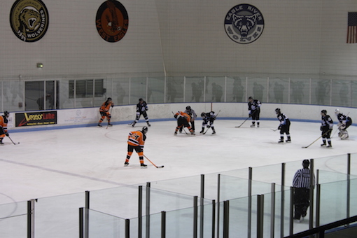 Here is the West High JV hockey team going against Chugiak High School, in the middle of the second quarter.