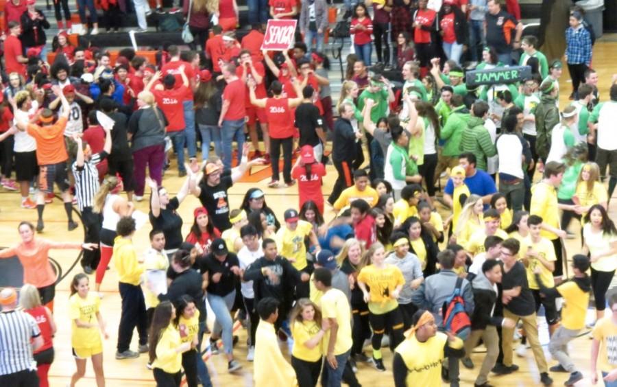 Students rushed the gym floor during the SWOOP Dance Off competition at the West High gym on Feb. 5.