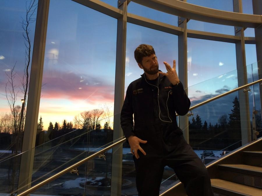 Macklemore fan, Sven Berglund, listens to "This Unruly Mess I've Made" in the new CTE wing at West Anchorage High School, Mar. 23.