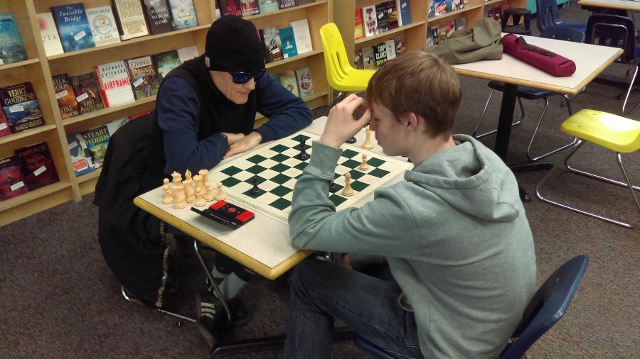 Silas Cook (right) and Charles Jacobs (left) play an endgame battle at the Title Wave Bookstore, on Oct. 14, Friday.