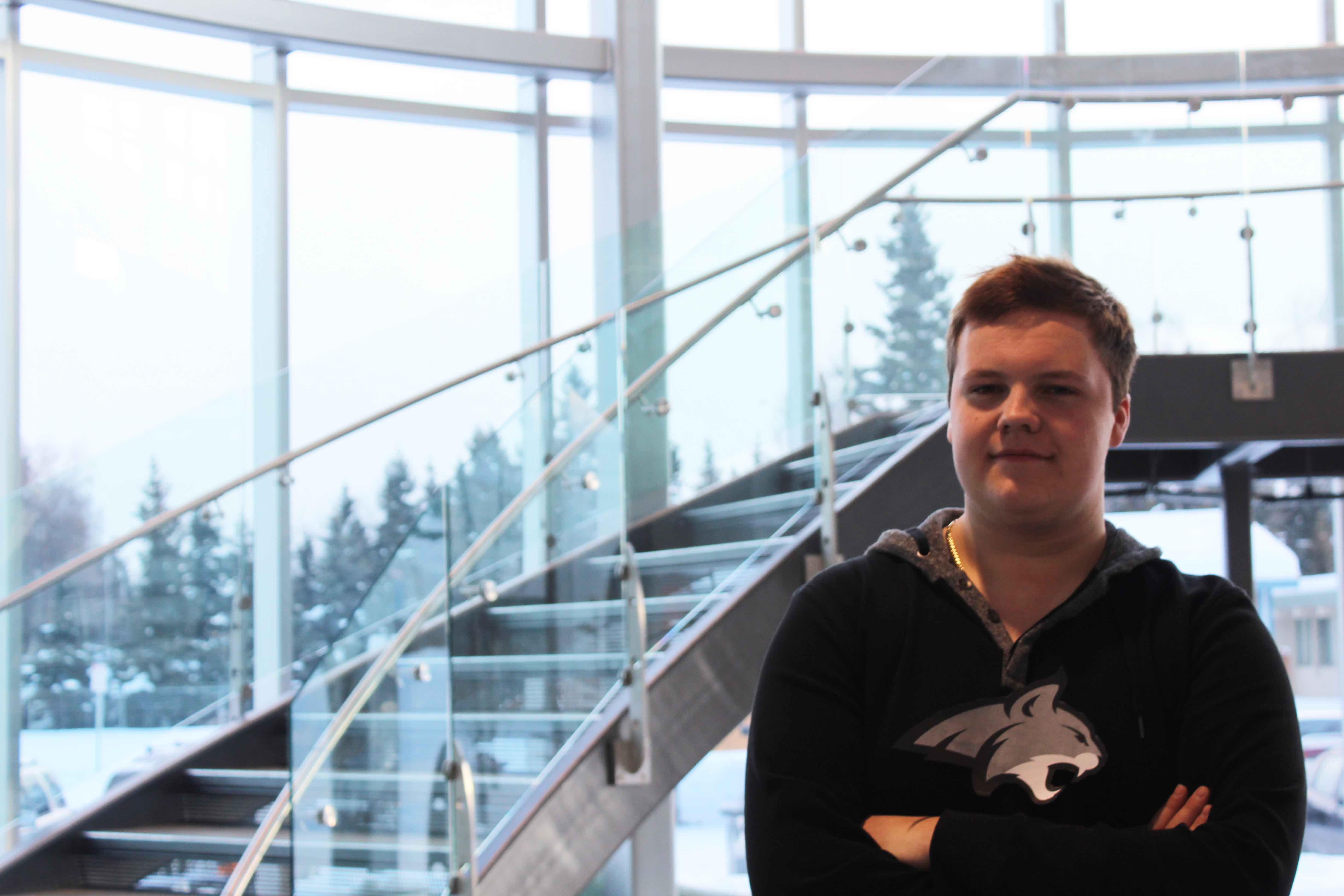West Anchorage High School senior, Ian Teders, sports his college gear after committing to Montana State University.