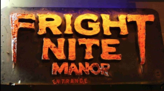 The Fright Nite Manor entrance sign overlooks customers as they walk into the entrance in the Northway Mall on October 22, 2018.