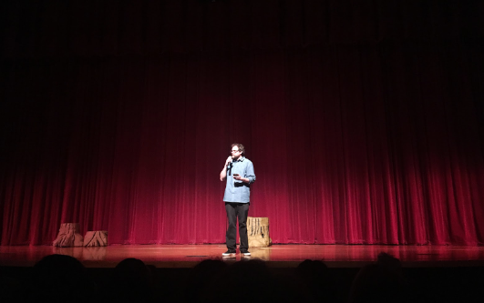 Rees Miller, theatre director at West Anchorage High School, introduces the play Winnie the Pooh on November 2. 