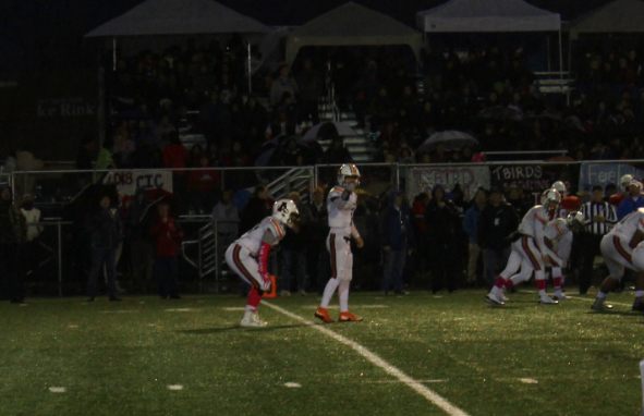 Bubba Mendoza at Quarterback calls the play as the Eagles take the ball down to field.