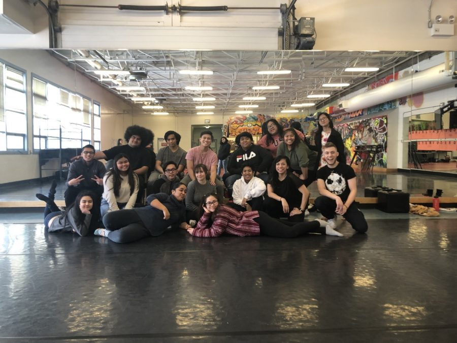 Tech crew posing for group picture in the Dance room.
