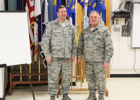Col. Strickland and SMSgt. Ullom stand together for a picture.